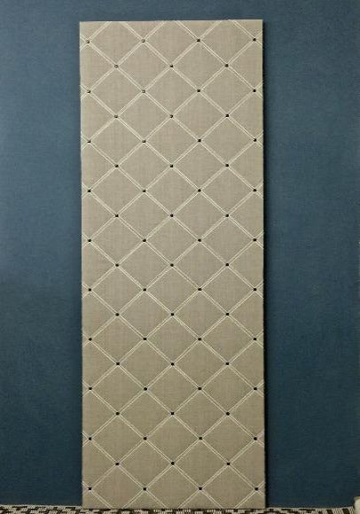 A notice board covered with French natural linen and cream/black narrow stripes ribbons