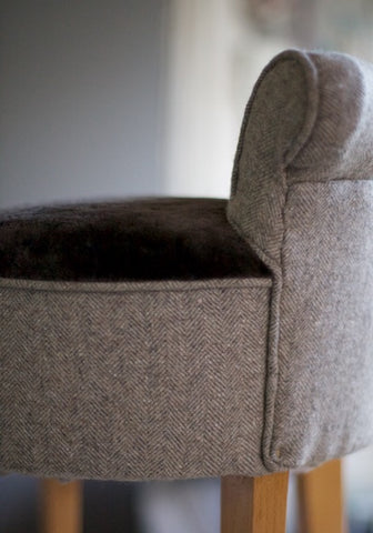 Paif of vintage small chairs coverd in wool and sheepskin upholsted by Kiki Voltaire