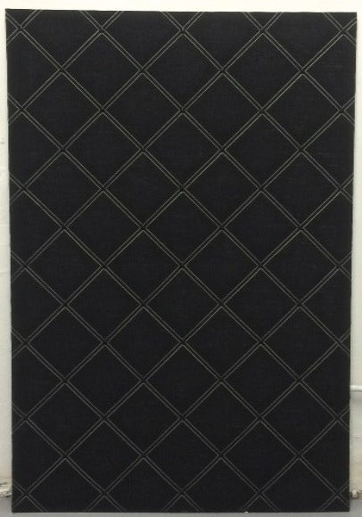 A large notice board in black linen with black ribbons with beige edges